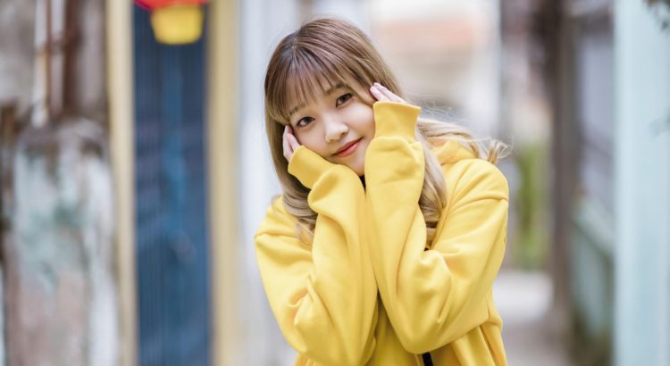 girl in yellow hoodie